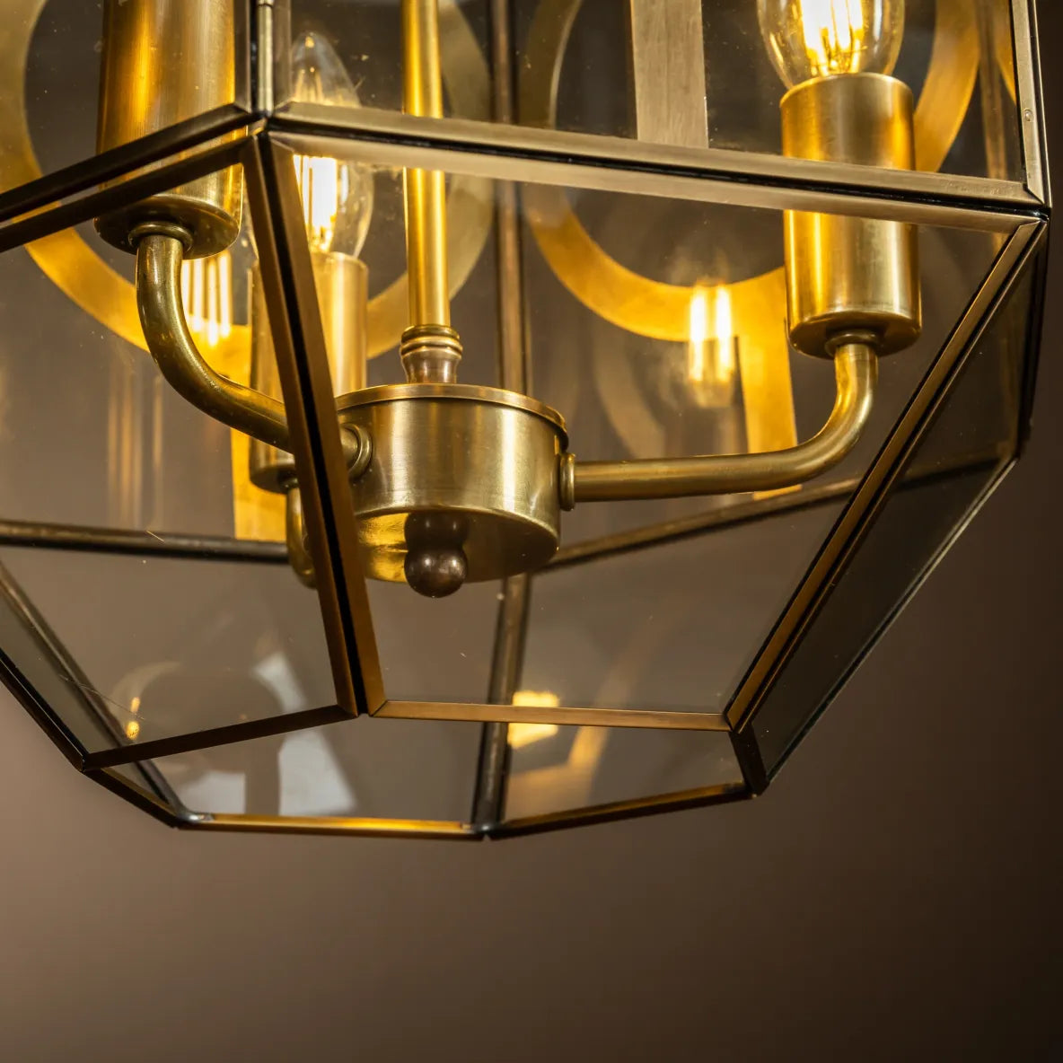 close up of brass pendant light fixture
