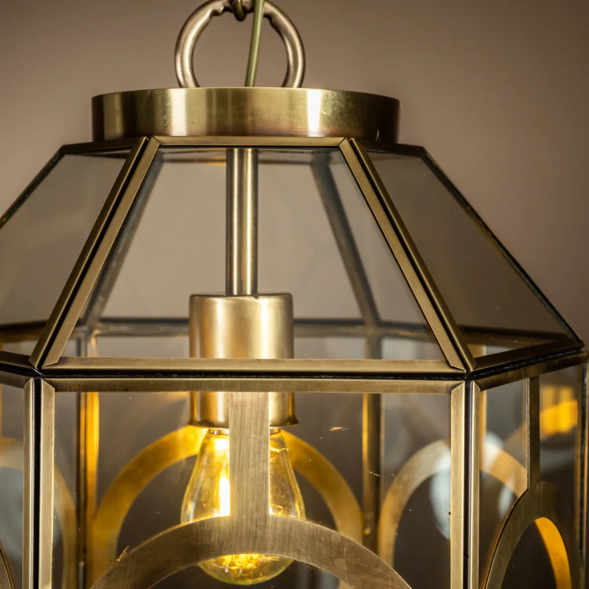 close up of brass pendant light fixture