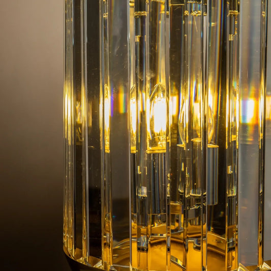 close up of glass 6 light brass pendant light