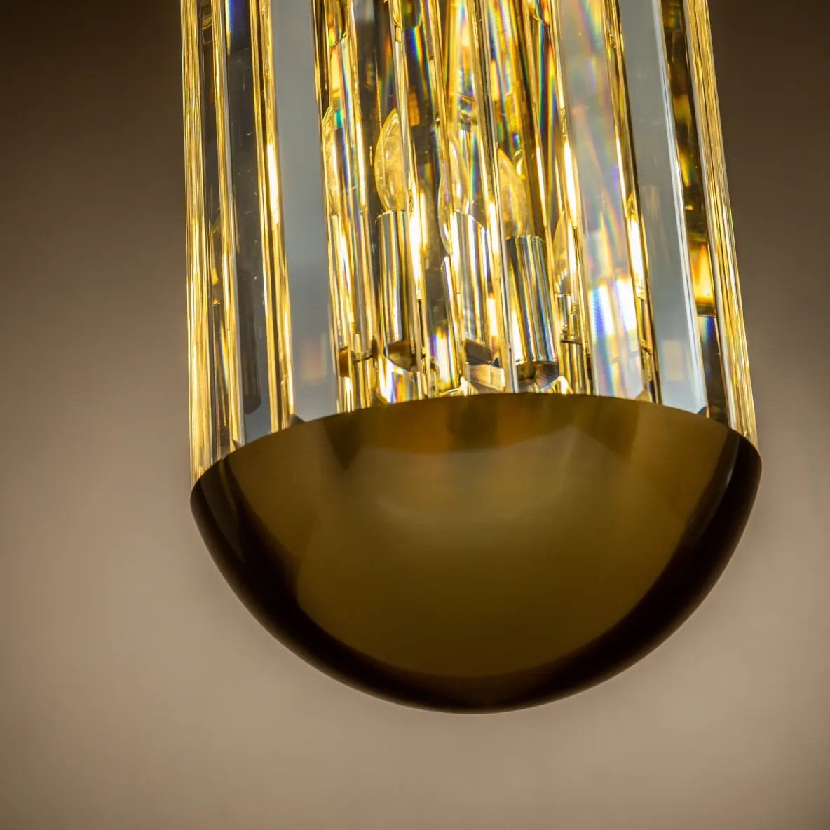 close up of large 6 light brass pendant light