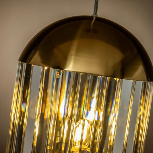 close up of top of 3 light brass pendant light 